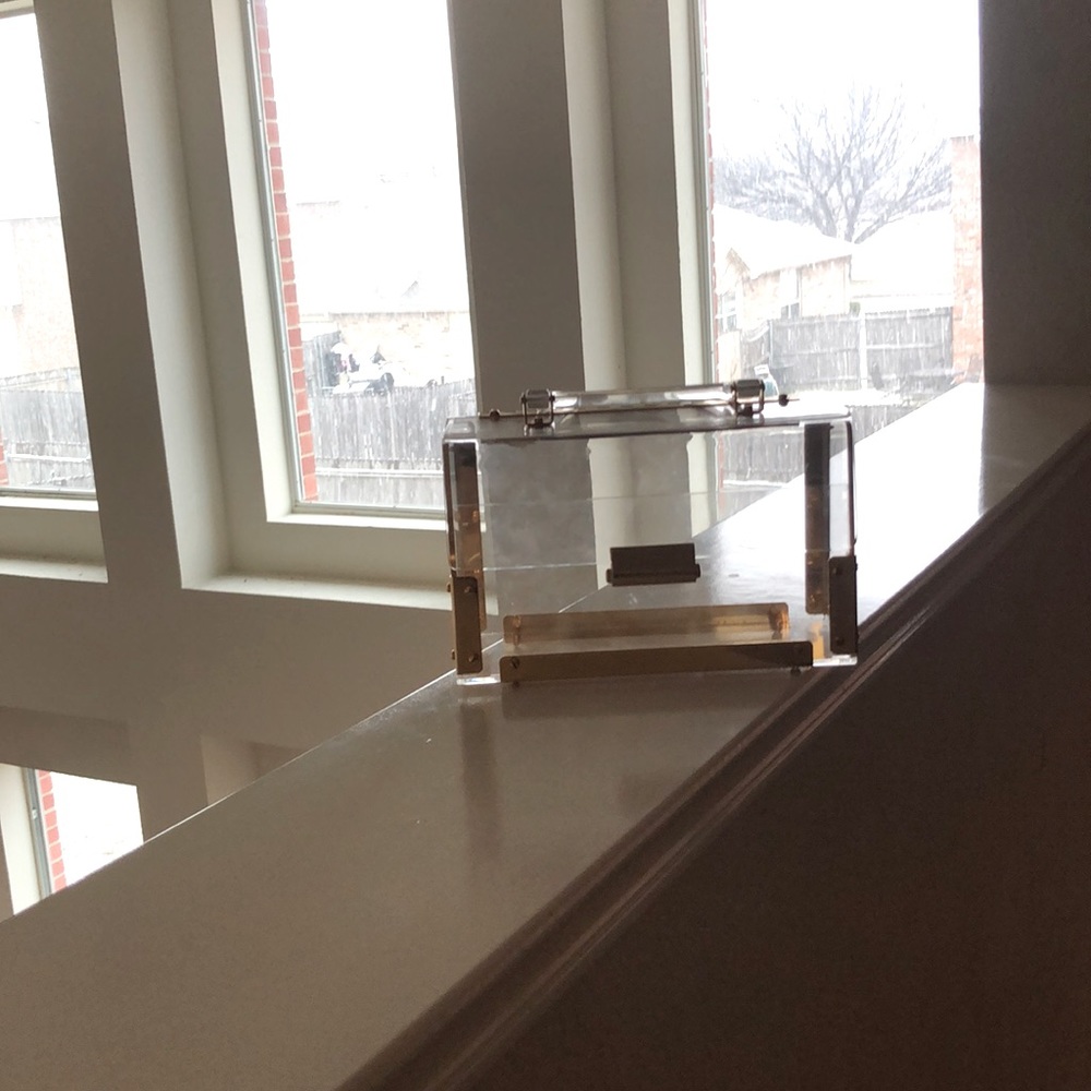 Clear and gold purse